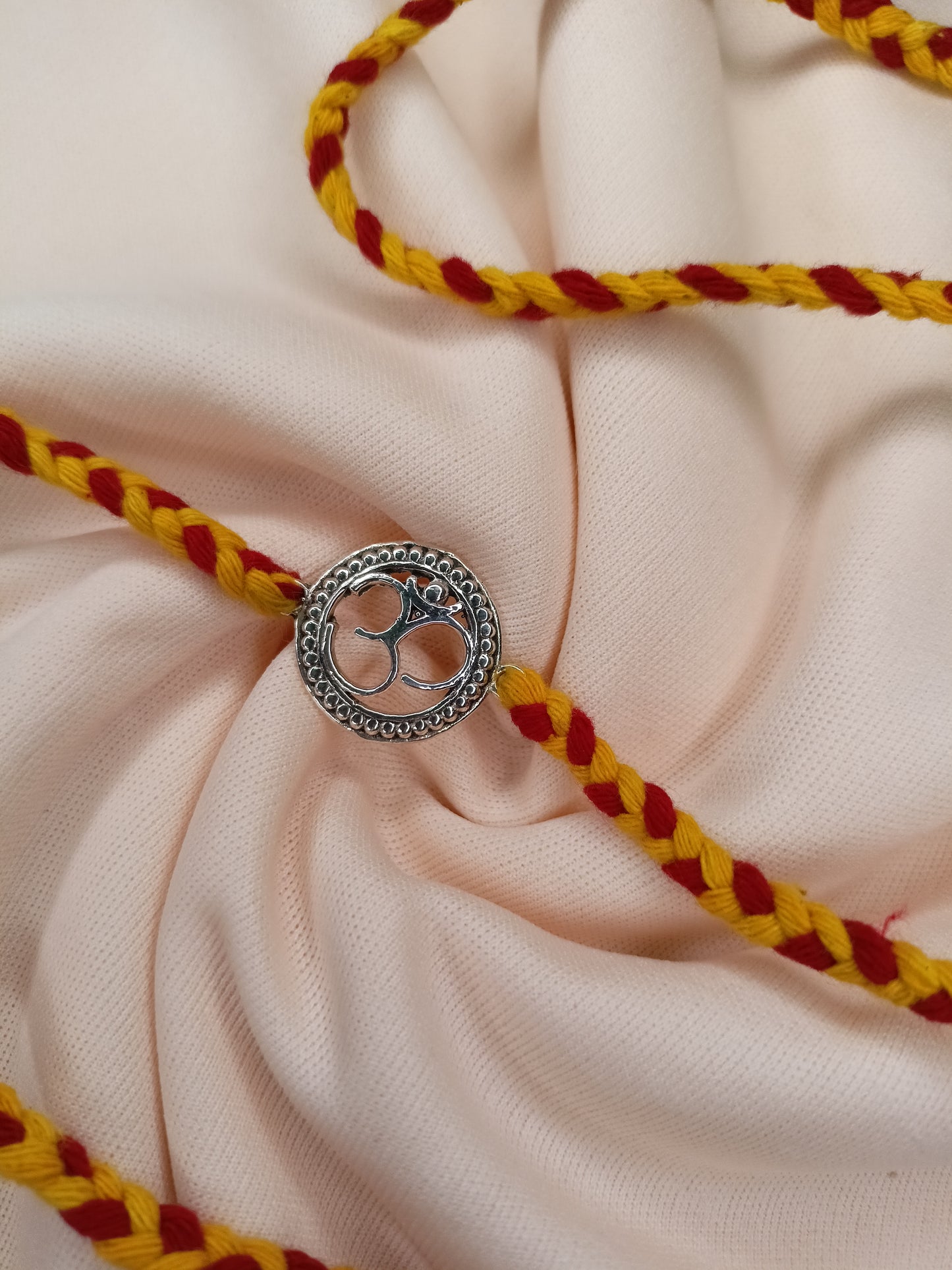 Candrin Om Rakhi
