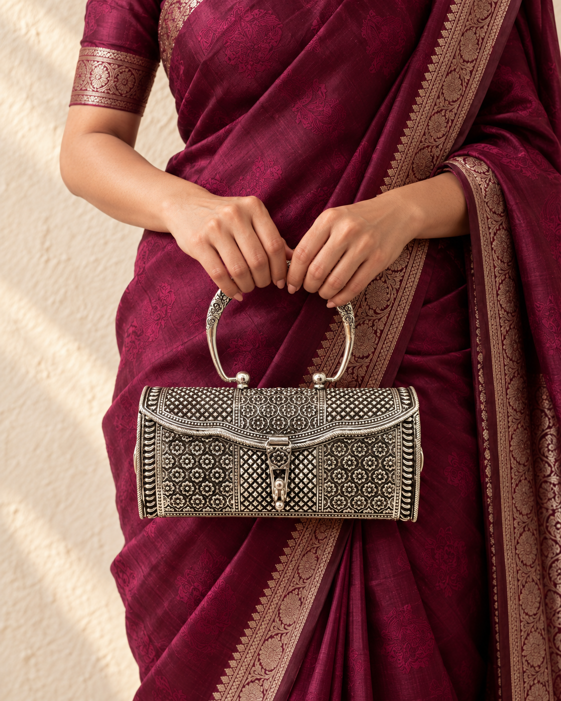 Vinyas Silver Handbag - Hand Holding with Saree