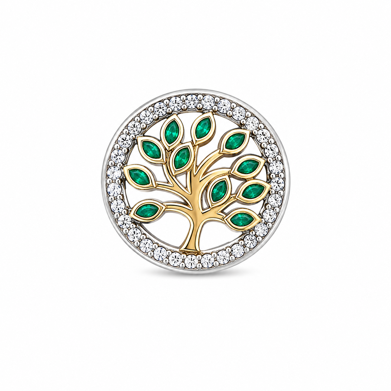 A round tree-of-life style jewelry charm or brooch featuring a gold tree with green leaf accents, surrounded by a silver border set with small clear stones, on a plain white background.